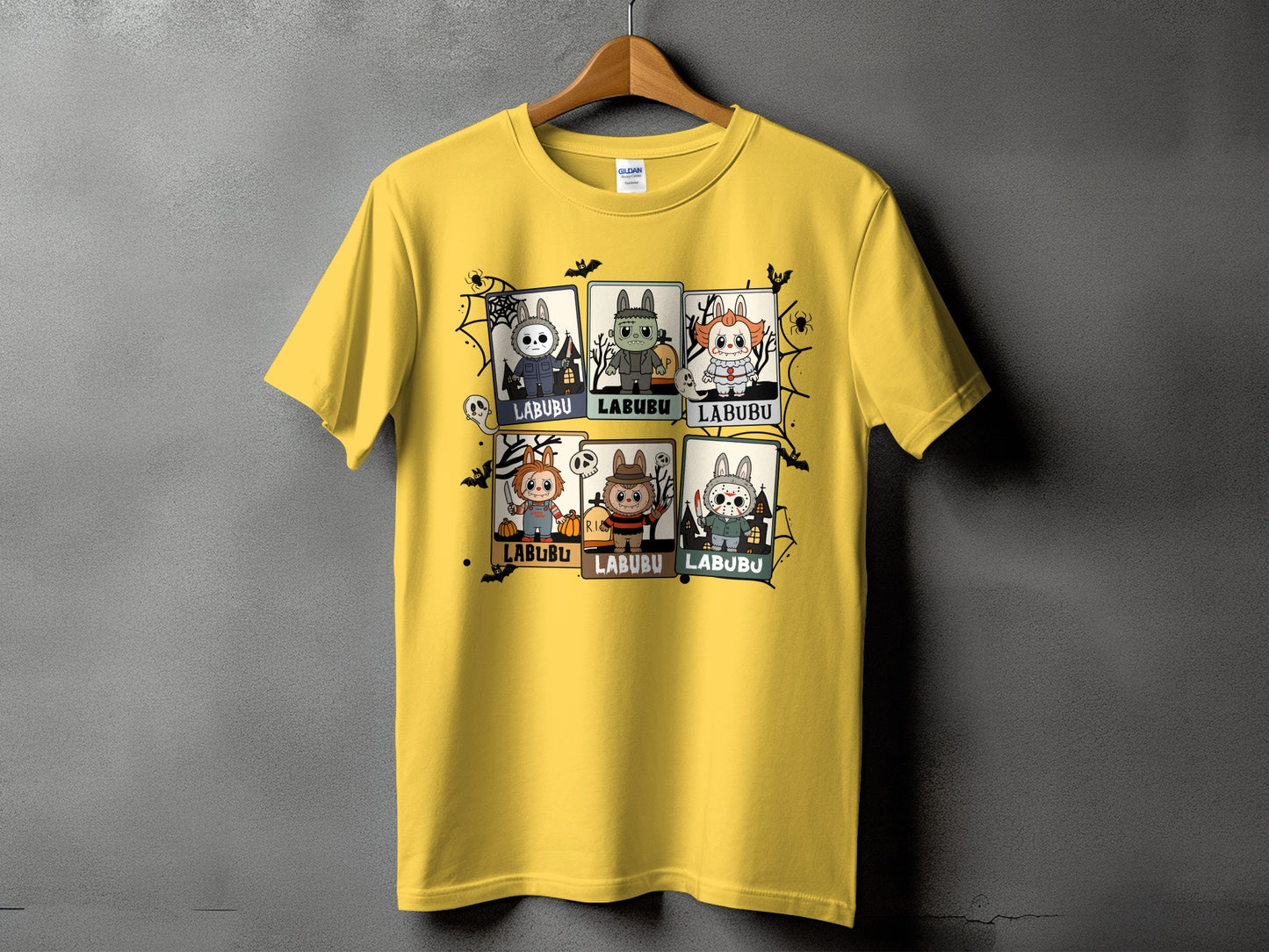 Yellow t-shirt with six panels of cartoon Halloween characters, each labeled "LABUBU".
