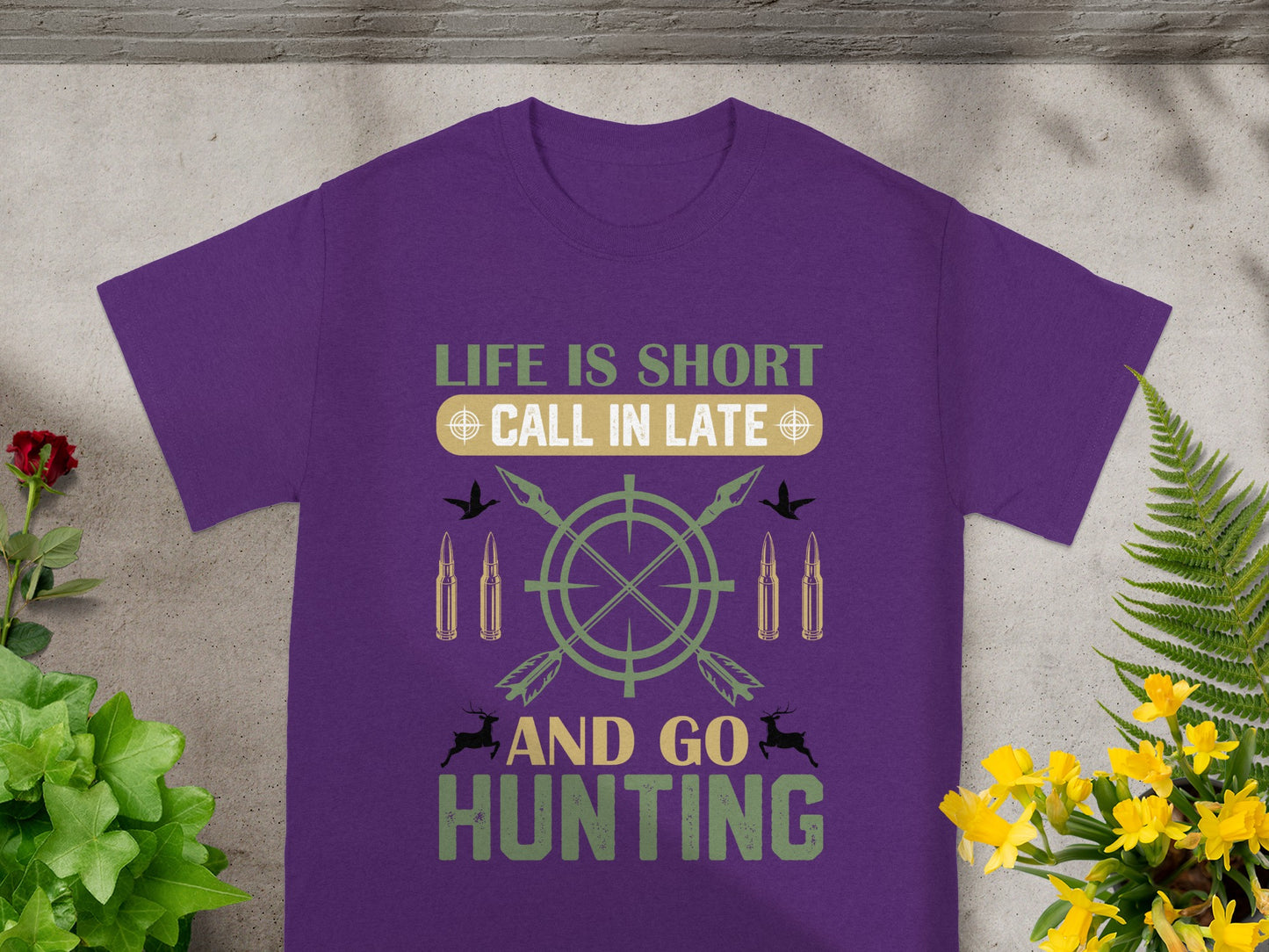 Purple t-shirt with "LIFE IS SHORT CALL IN LATE AND GO HUNTING" text and hunting graphics.