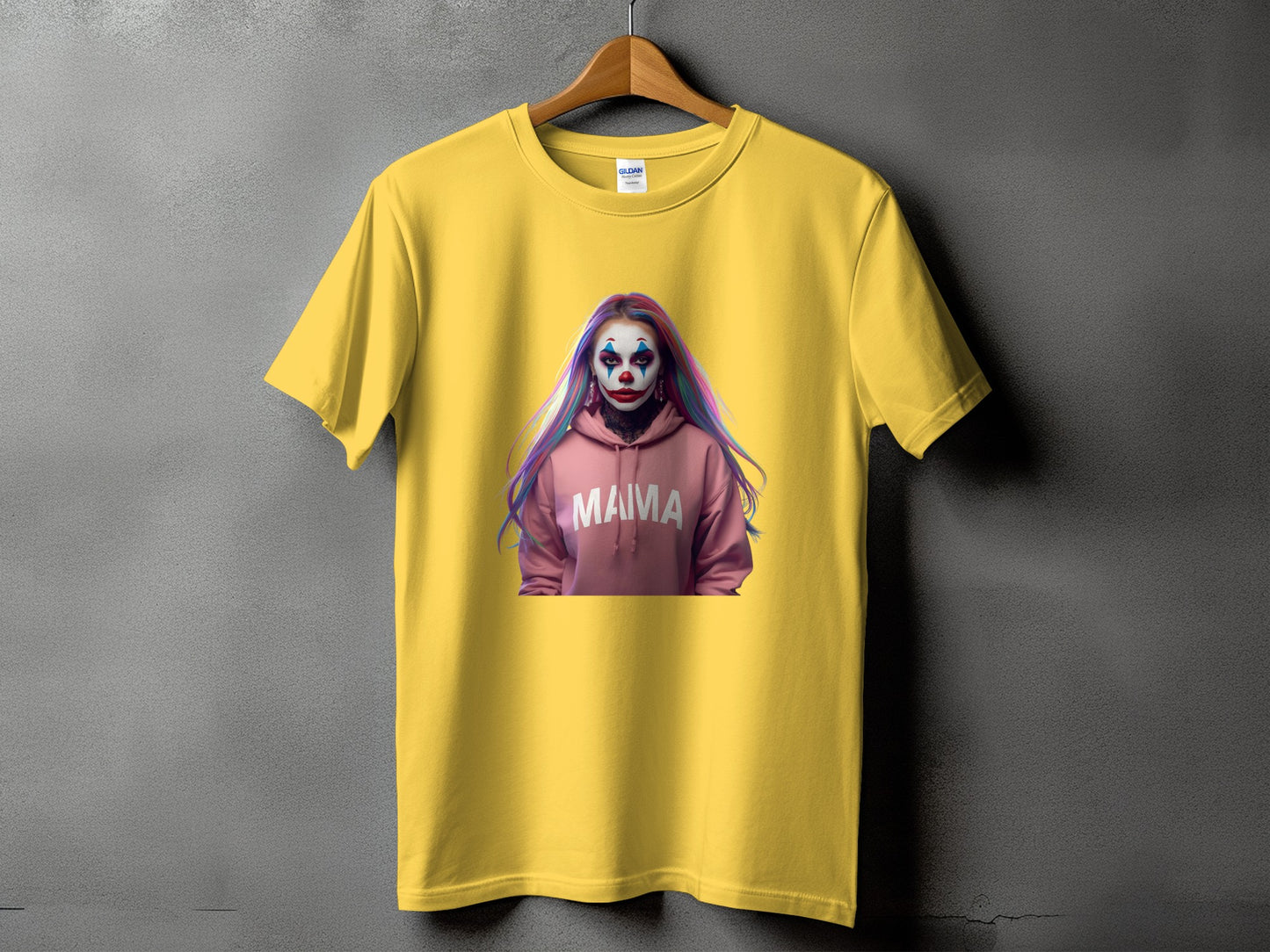 Yellow t-shirt with a graphic of a woman in clown makeup and a pink hoodie saying "MAMA".
