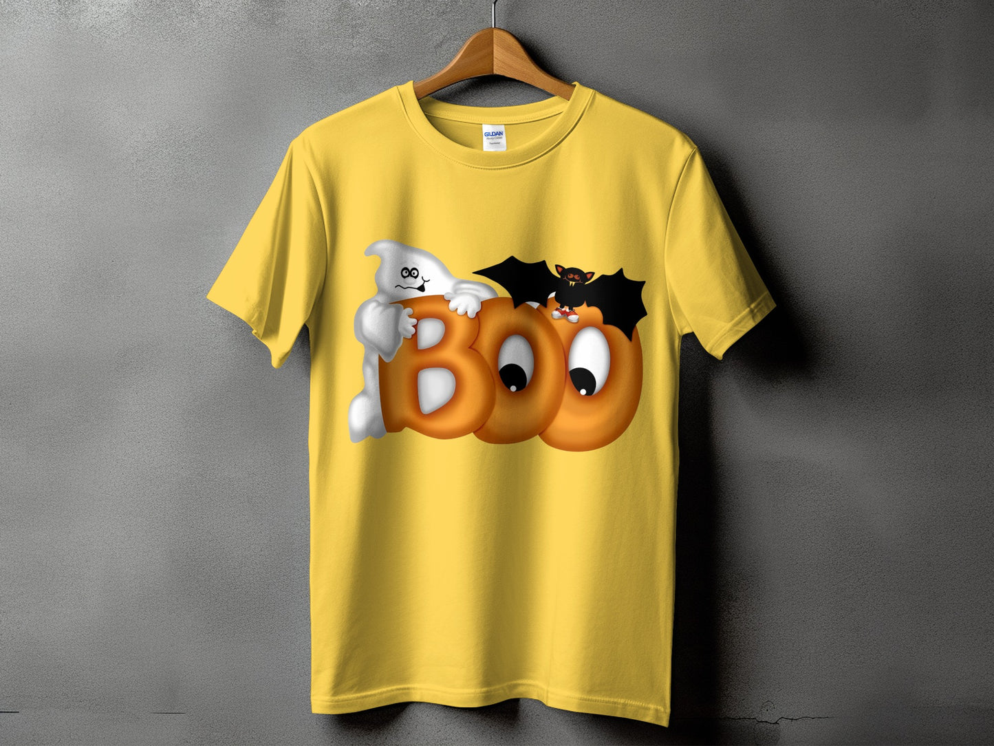 Yellow t-shirt with cartoon ghost, bat, and "BOO" text graphic.