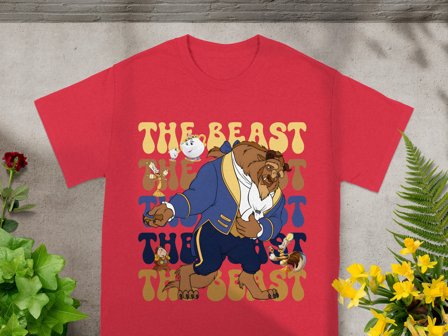 Red t-shirt with Belle, Mrs. Potts, Lumiere, Cogsworth, and the Beast.