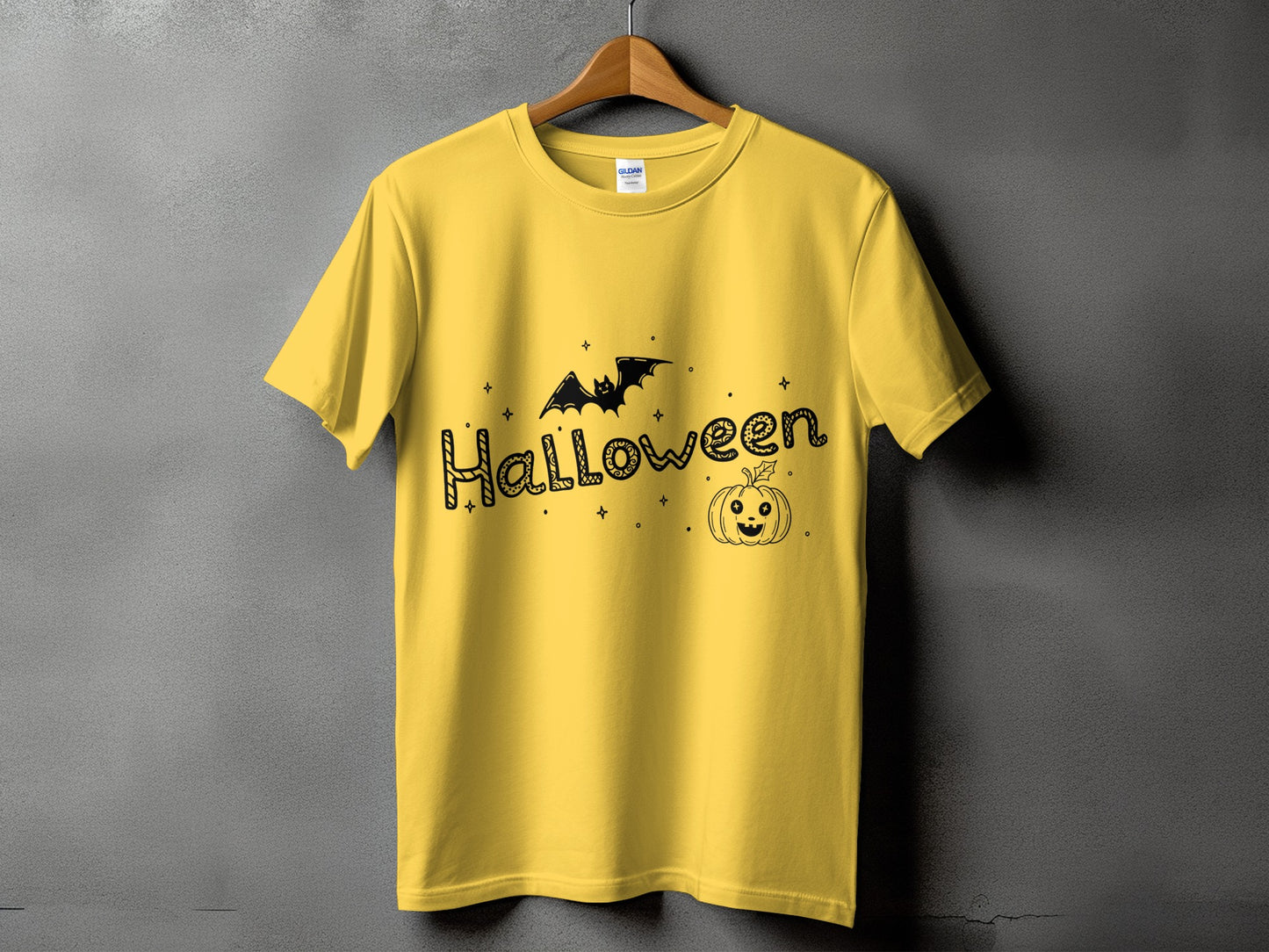 Yellow t-shirt with "Halloween" text, a bat, and a pumpkin graphic.