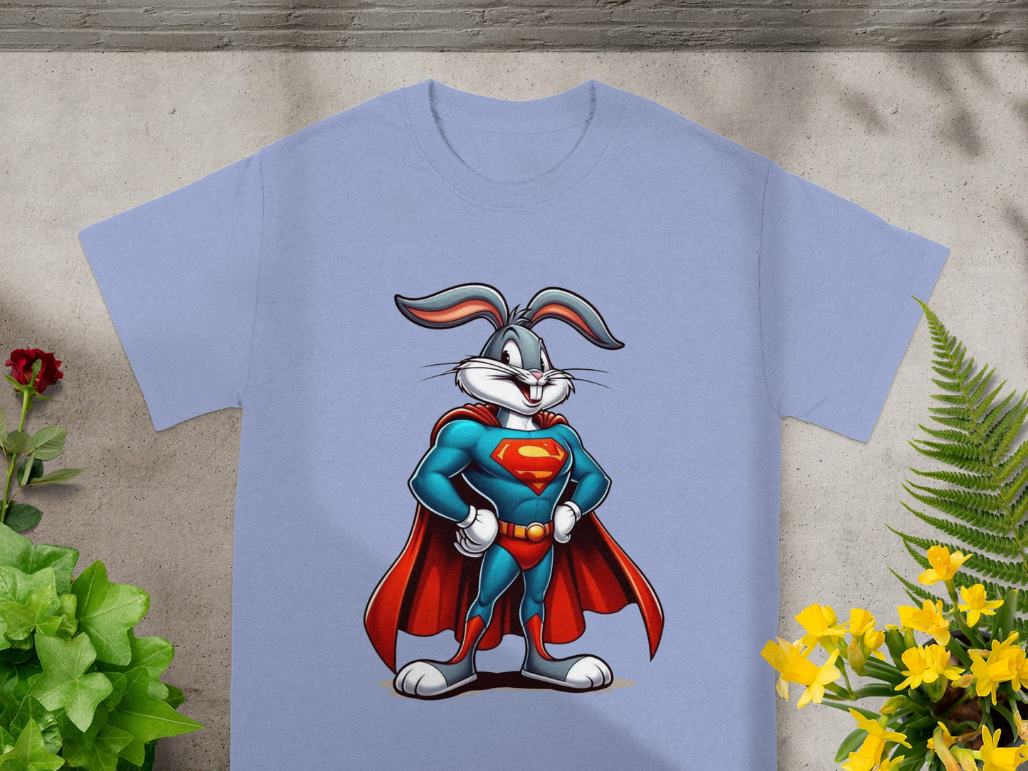 Bugs Bunny dressed as Superman on a light purple t-shirt.
