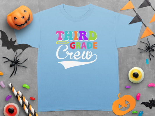 Light blue t-shirt with "Third Grade Crew" text and Halloween decorations.