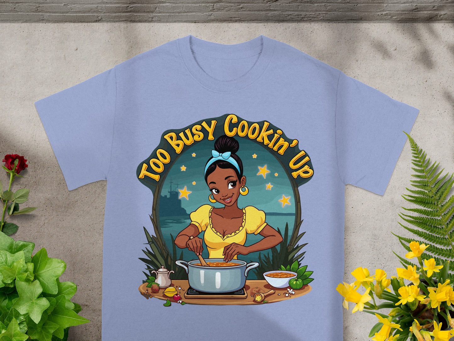Tiana in yellow shirt cooking in pot with "Too Busy Cookin' Up" text.