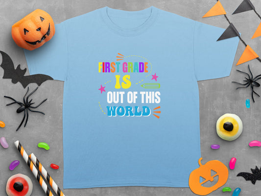Light blue t-shirt with "First Grade is Out of This World" text.
