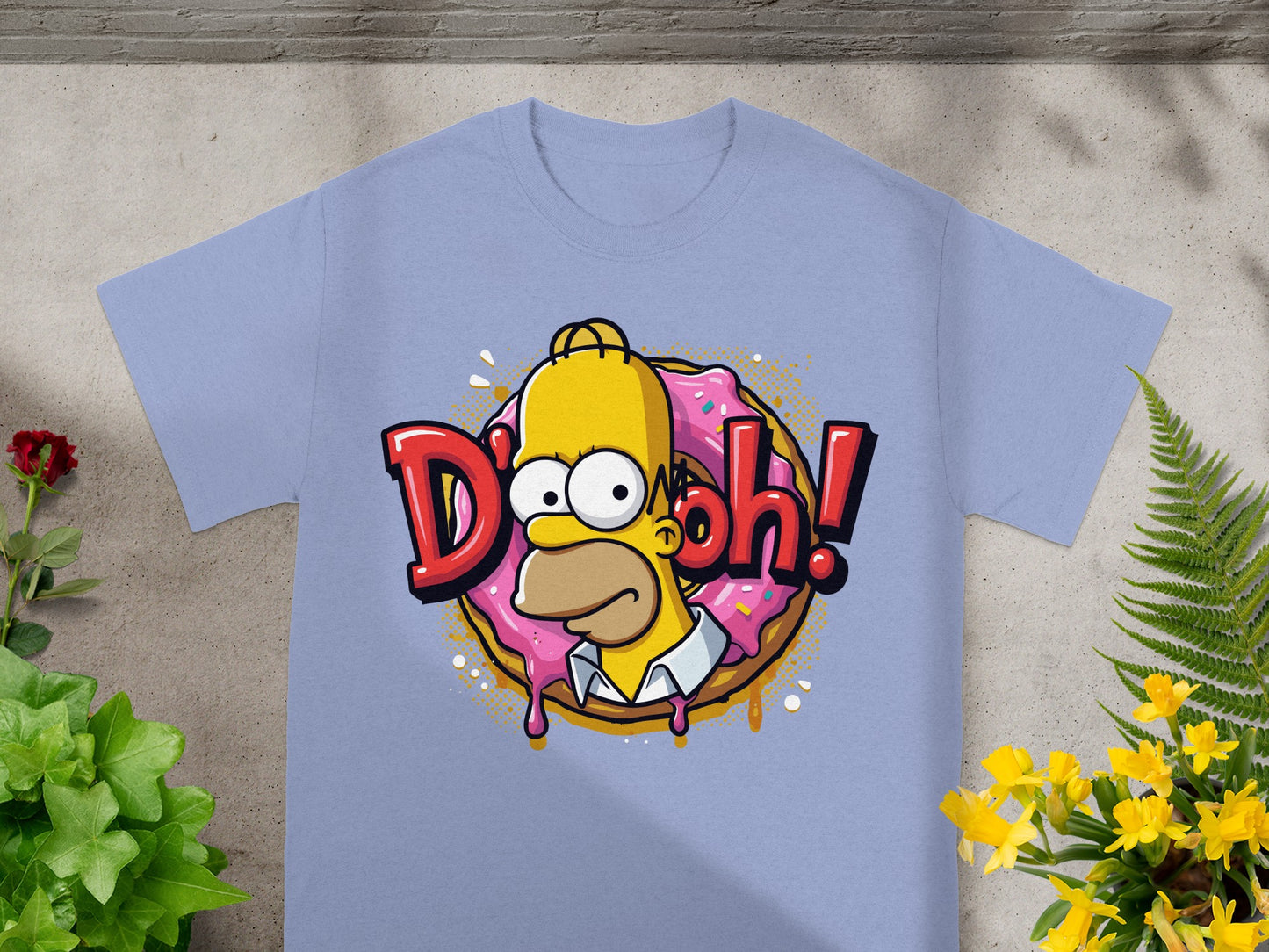 Homer Simpson in a donut saying "D'oh!" on a light purple t-shirt.
