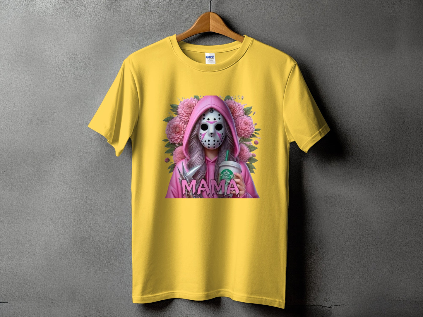 Yellow t-shirt with a graphic of a masked figure holding a coffee cup and the word "MAMA".