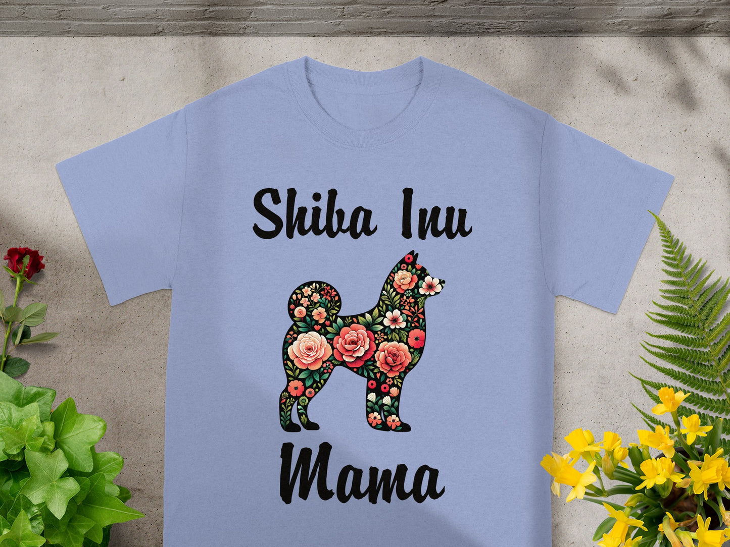 Light purple t-shirt with black text "Shiba Inu Mama" and floral dog silhouette.