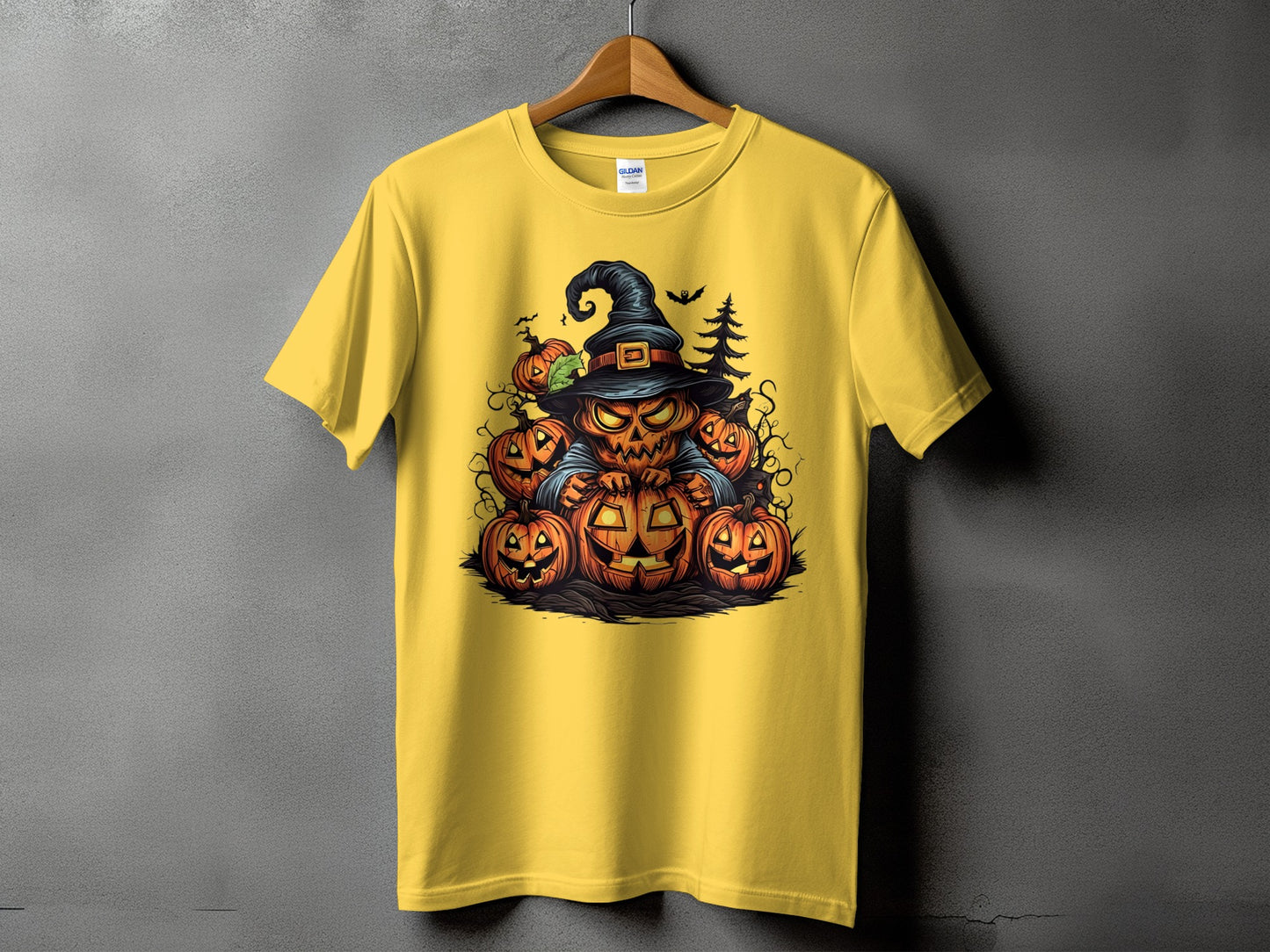 Yellow t-shirt with a Halloween design featuring a grinning jack-o'-lantern character.