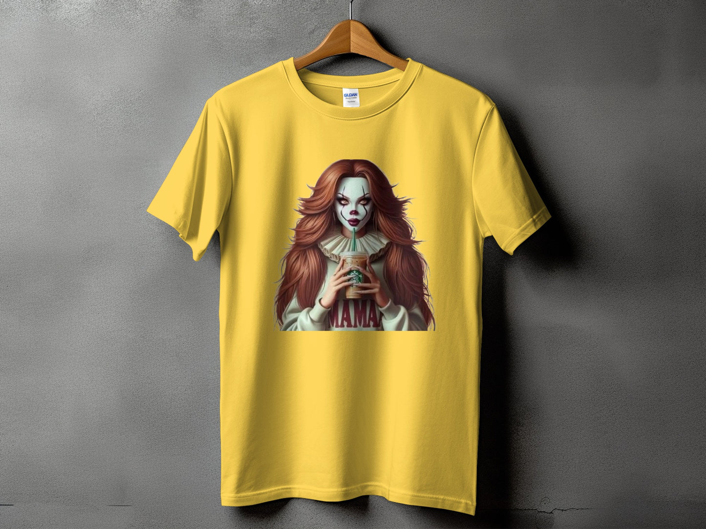 Yellow t-shirt with creepy clown design holding a coffee cup, text "MAMA".