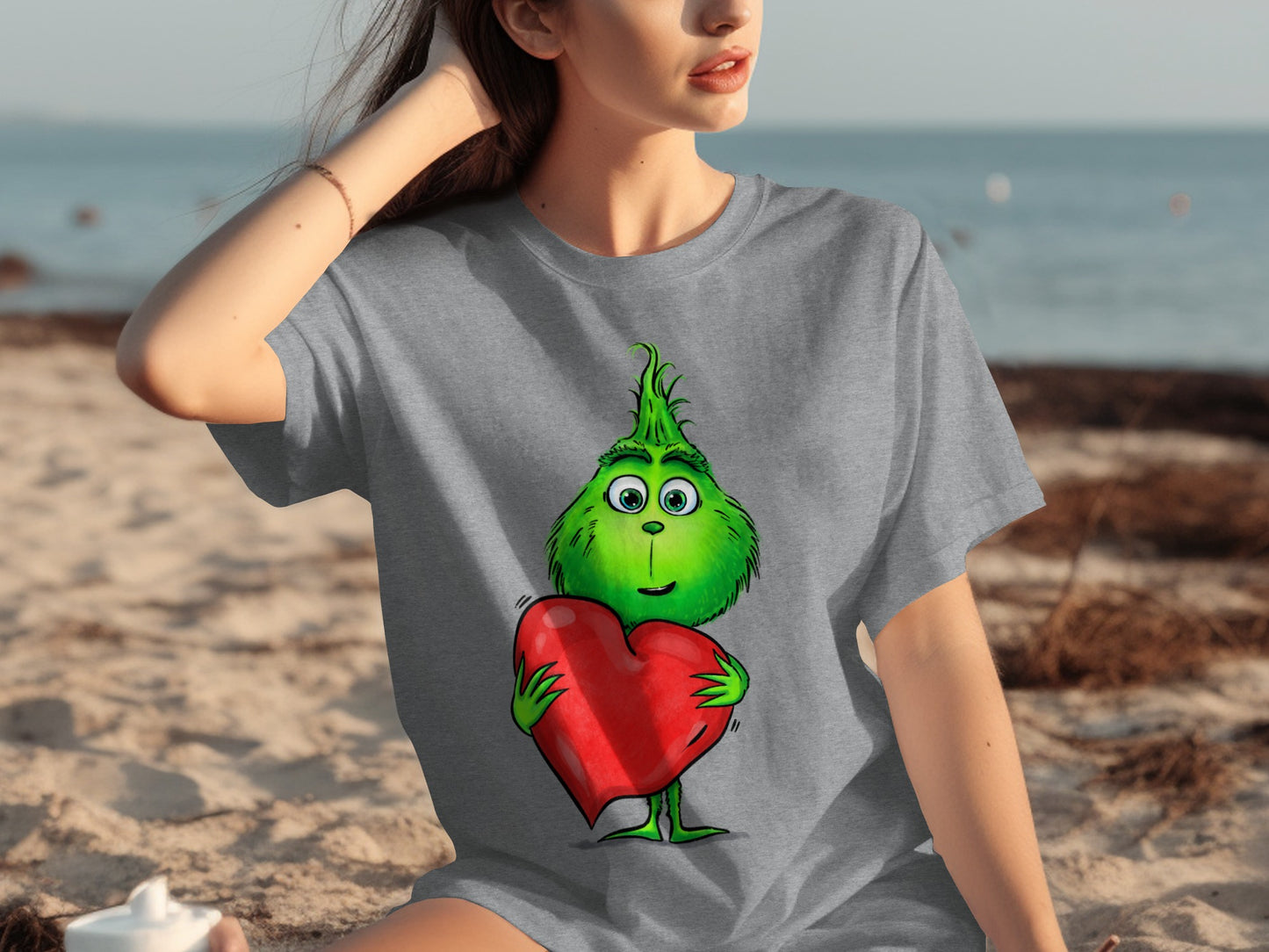 Cute Green Grinch Holding a Heart T-shirt