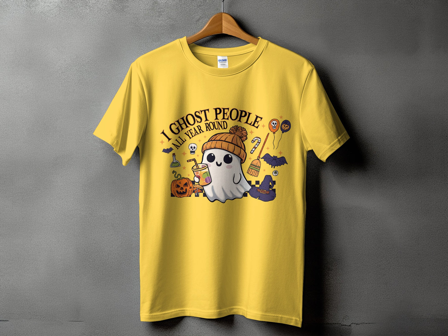 Yellow t-shirt with ghost graphic and text "I Ghost People All Year Round".