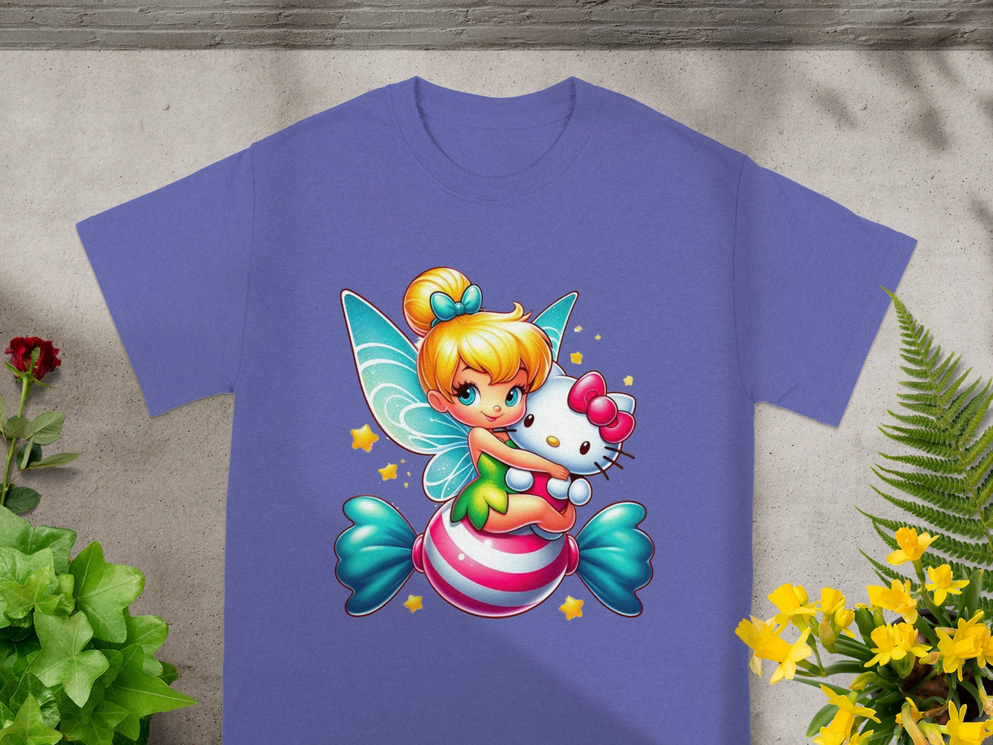 Fairy holding Hello Kitty on a candy cane striped ball.