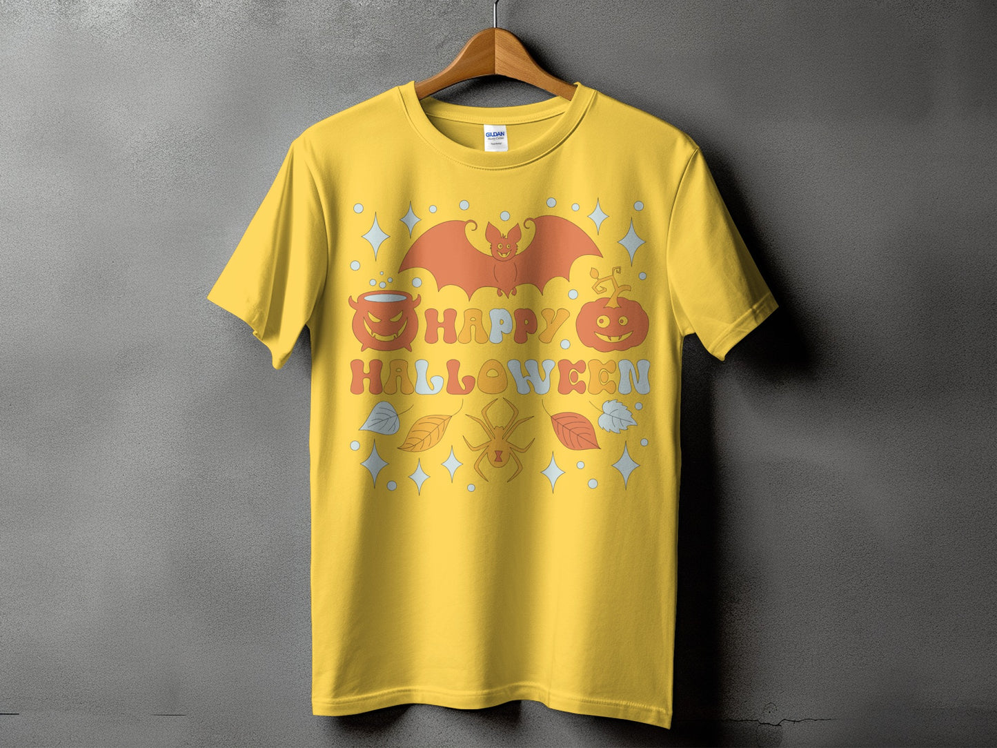 Yellow t-shirt with retro "Happy Halloween" design featuring bat, pumpkin, and spider.