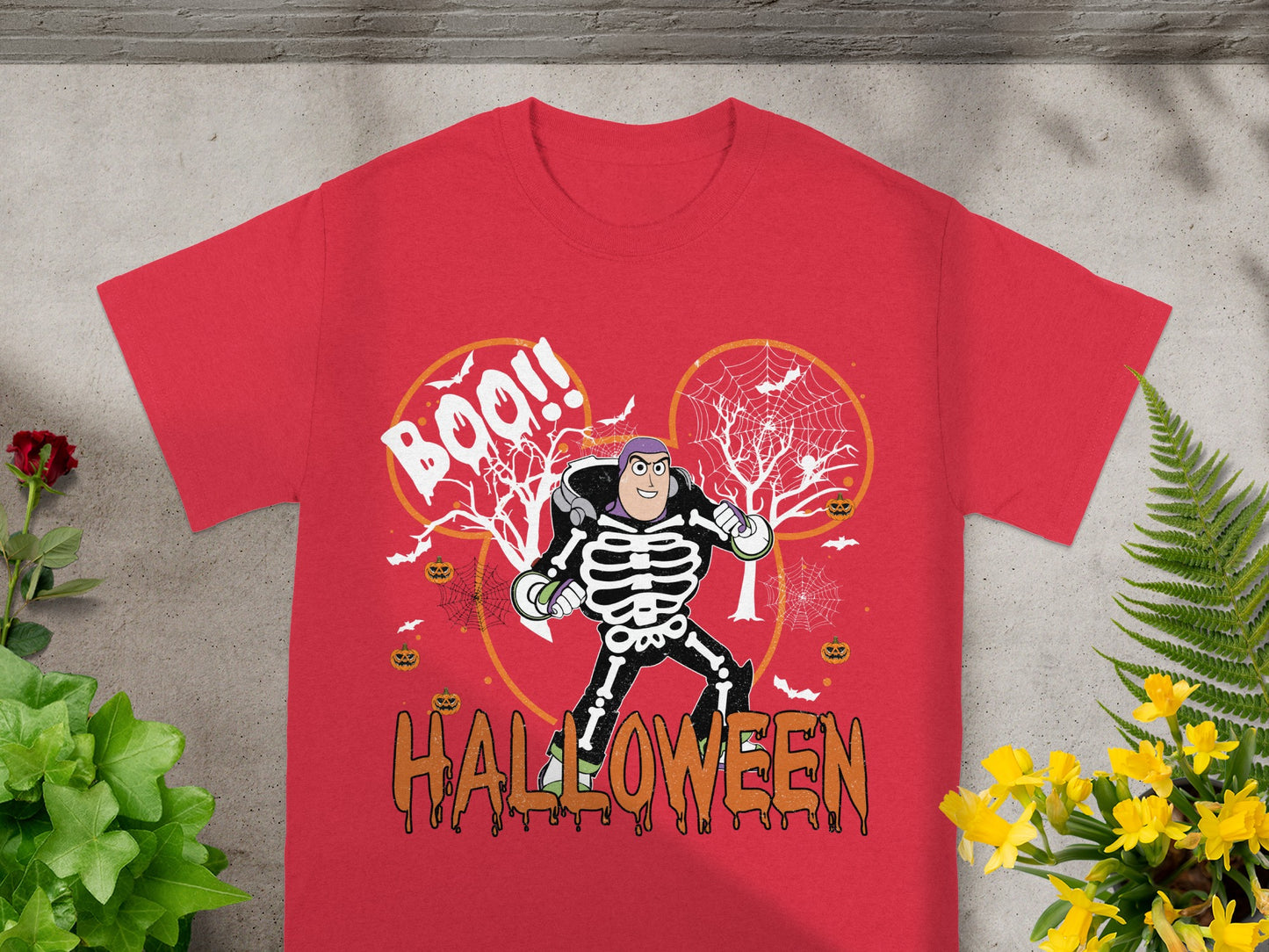 Buzz Lightyear in skeleton costume with Halloween text and graphic elements.