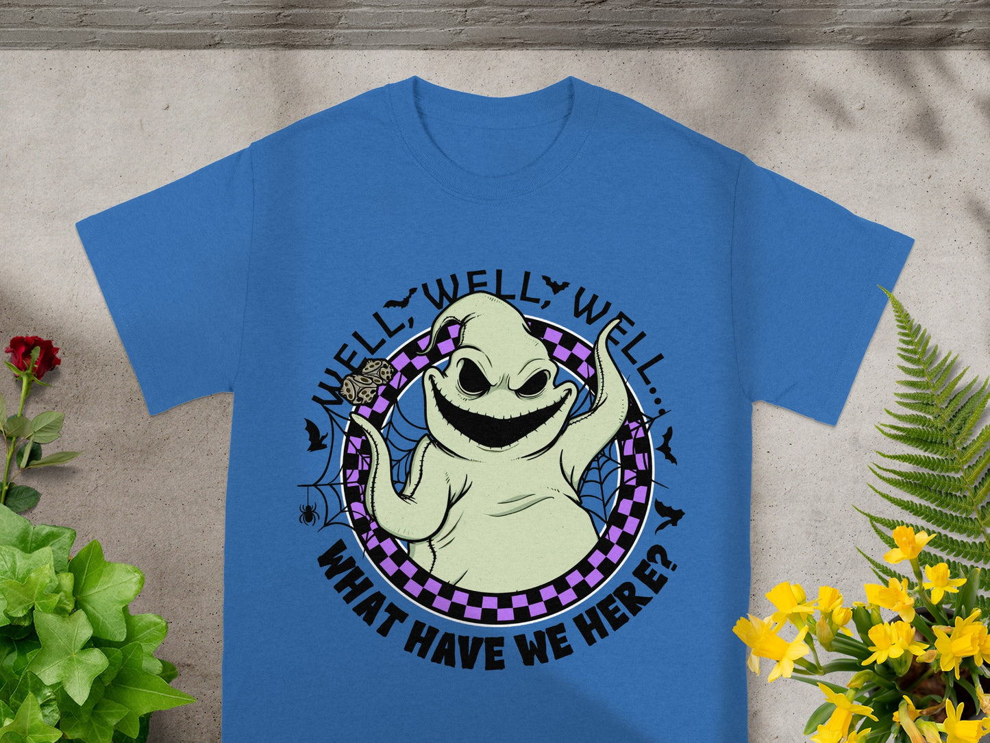 Blue t-shirt featuring Oogie Boogie with text "Well, well, well... What have we here?"