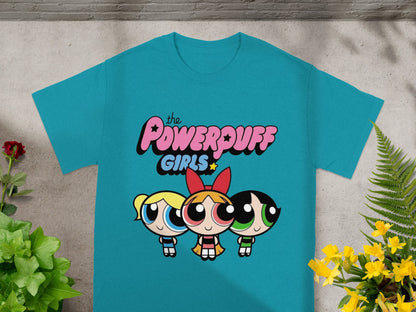 The Powerpuff Girls graphic on a teal t-shirt.