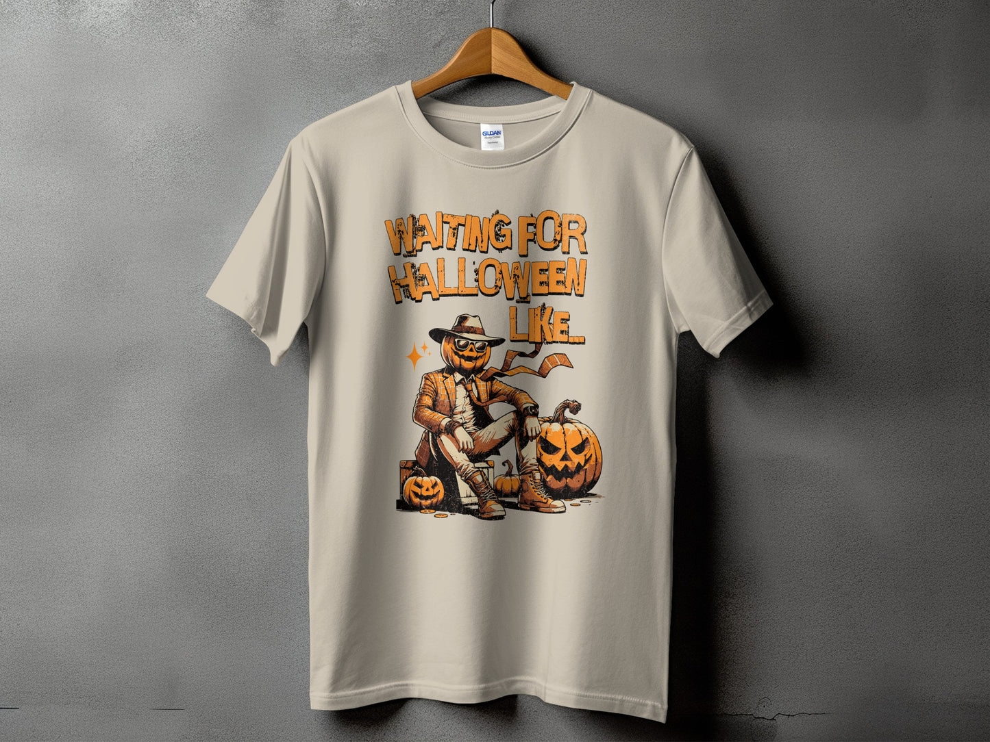 T-shirt with graphic of pumpkin character and text "Waiting For Halloween Like".
