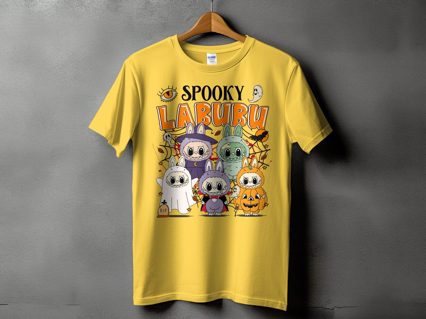 Yellow t-shirt with "SPOOKY LABURU" text and Halloween-themed cartoon characters.