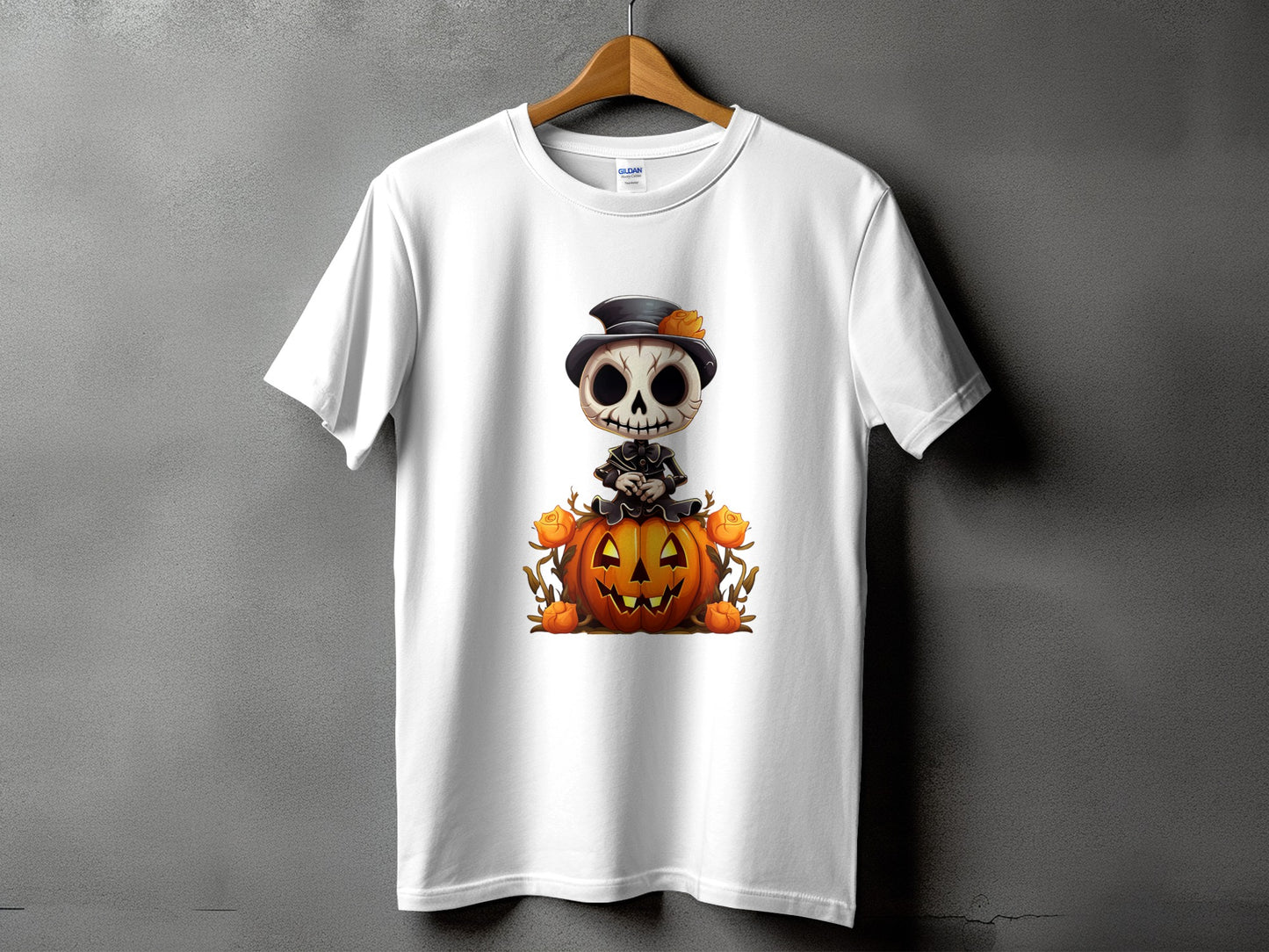 White t-shirt with a cartoon skeleton sitting on a pumpkin with roses.
