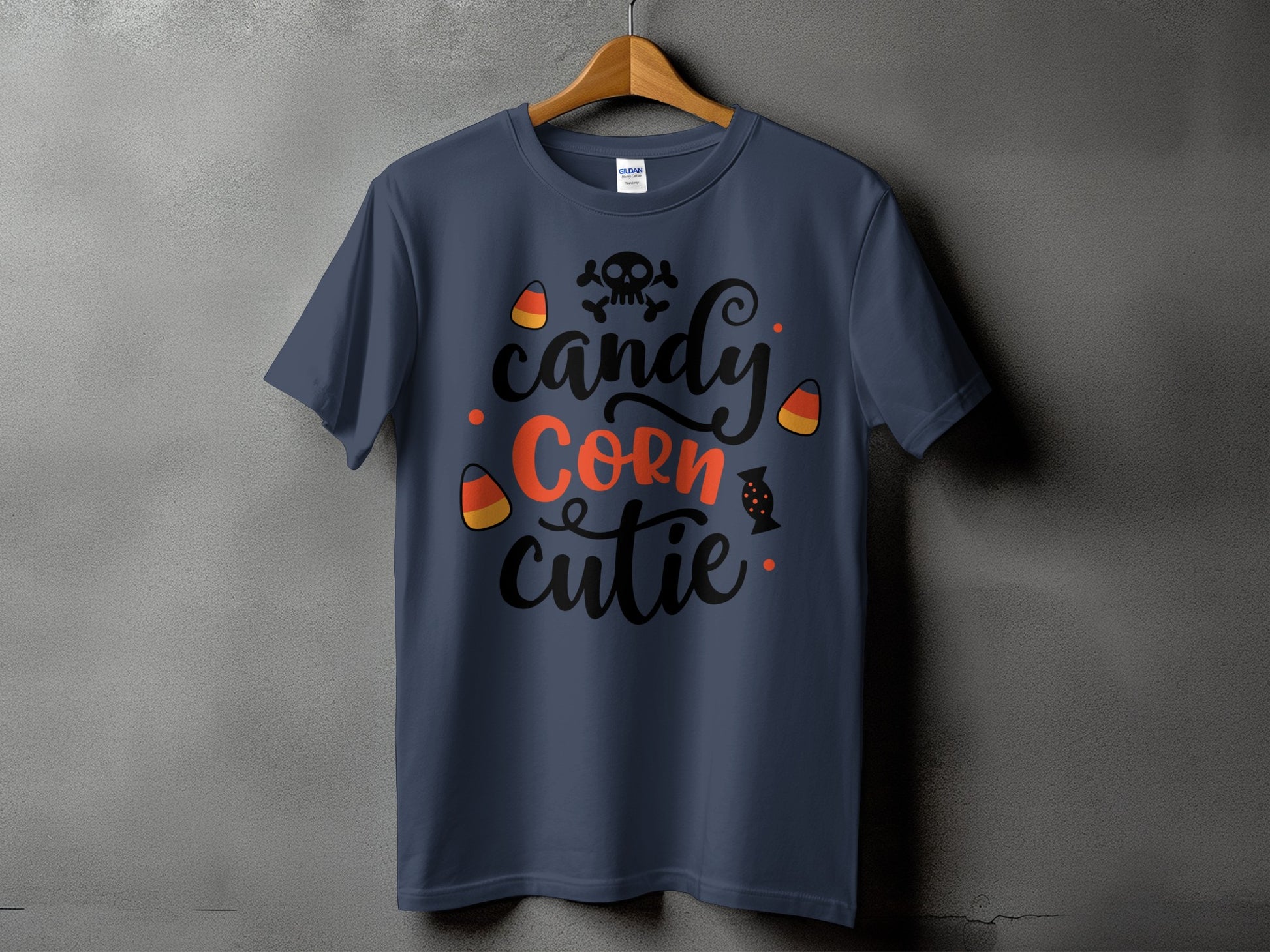 Navy t-shirt with "candy corn cutie" and Halloween graphics.