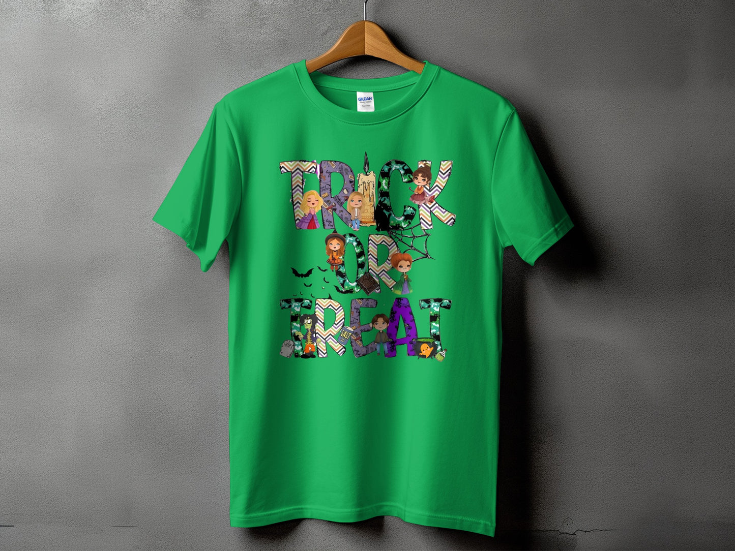 Green t-shirt with "Trick or Treat" text featuring witches and Halloween motifs.