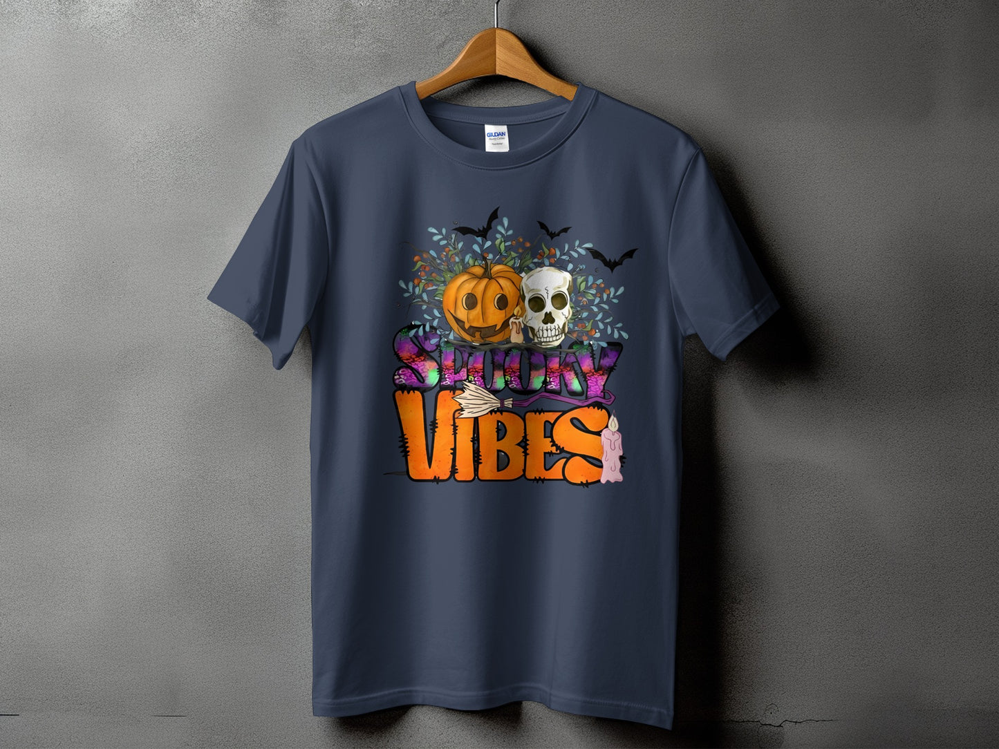 Navy t-shirt with "Spooky Vibes" text and Halloween graphics.