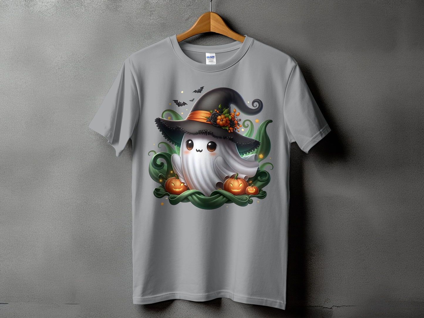 Grey t-shirt with a cute ghost wearing a witch hat and surrounded by pumpkins.