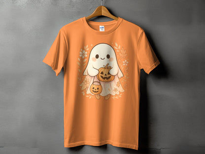 Orange t-shirt with a cute ghost holding pumpkins and surrounded by fall leaves.