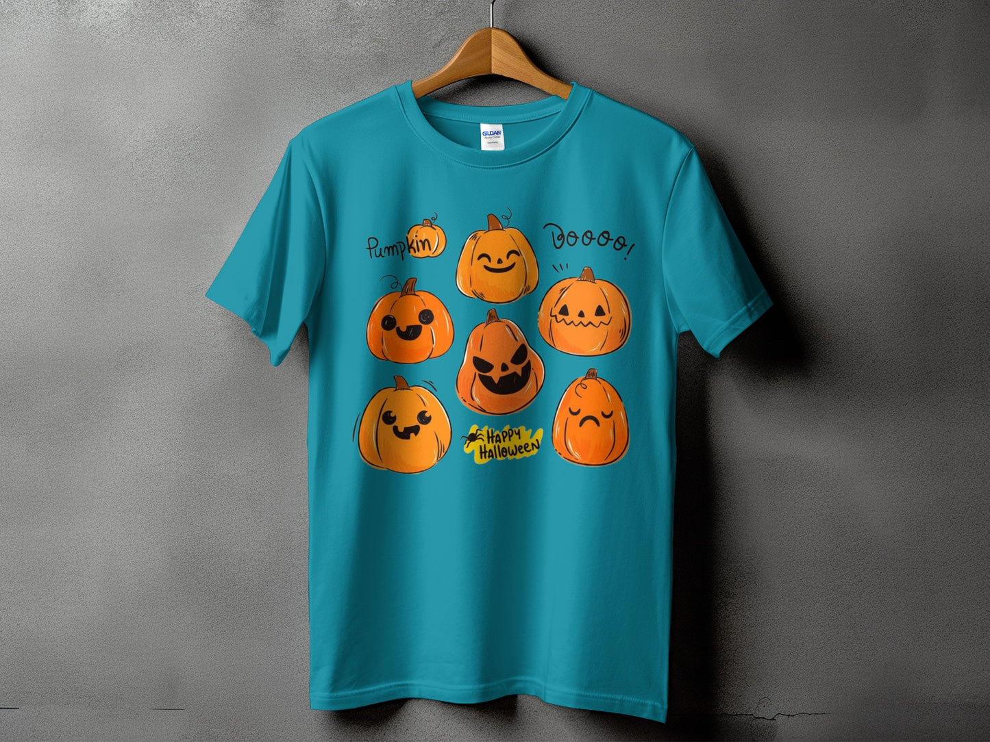 Teal t-shirt with assorted cartoon pumpkins and "Happy Halloween" text.