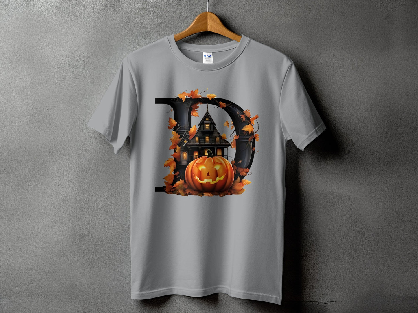 Gray t-shirt with a large black letter D and Halloween graphics.