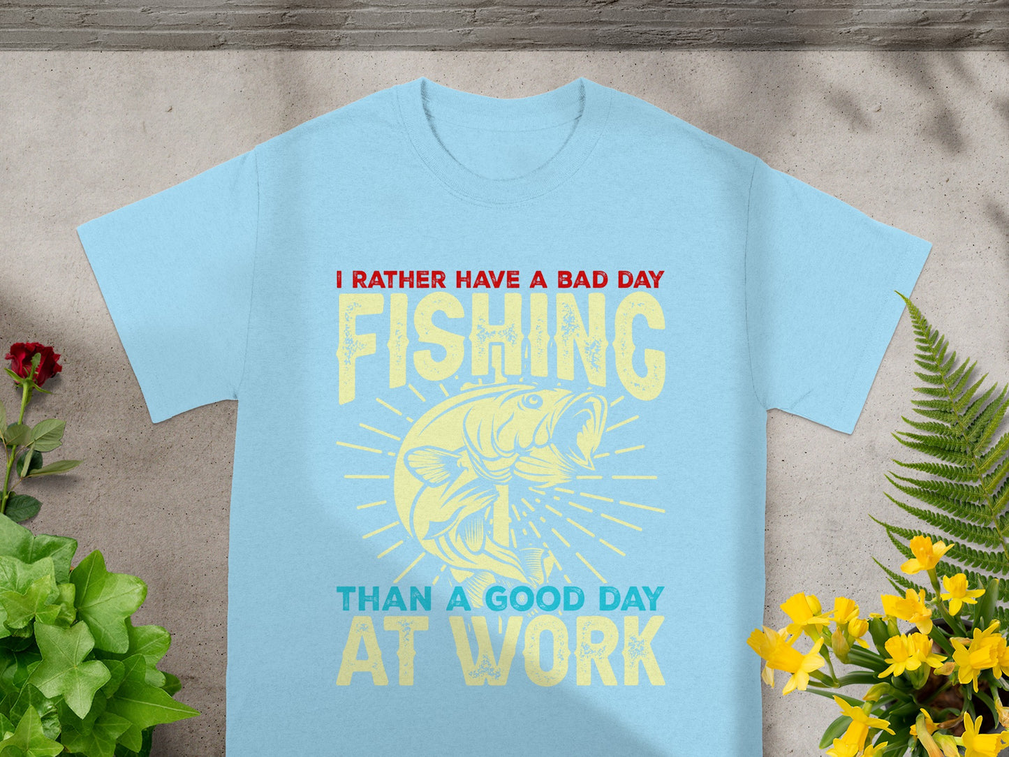 Light blue t-shirt with "I Rather Have a Bad Day Fishing Than a Good Day At Work" text and fish graphic.