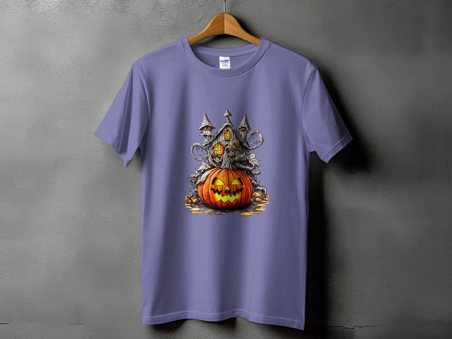 Purple t-shirt with a Halloween haunted house and jack-o'-lantern graphic.