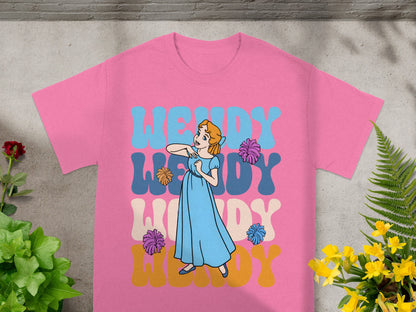 Pink t-shirt with Wendy in wavy letters and cartoon illustration.