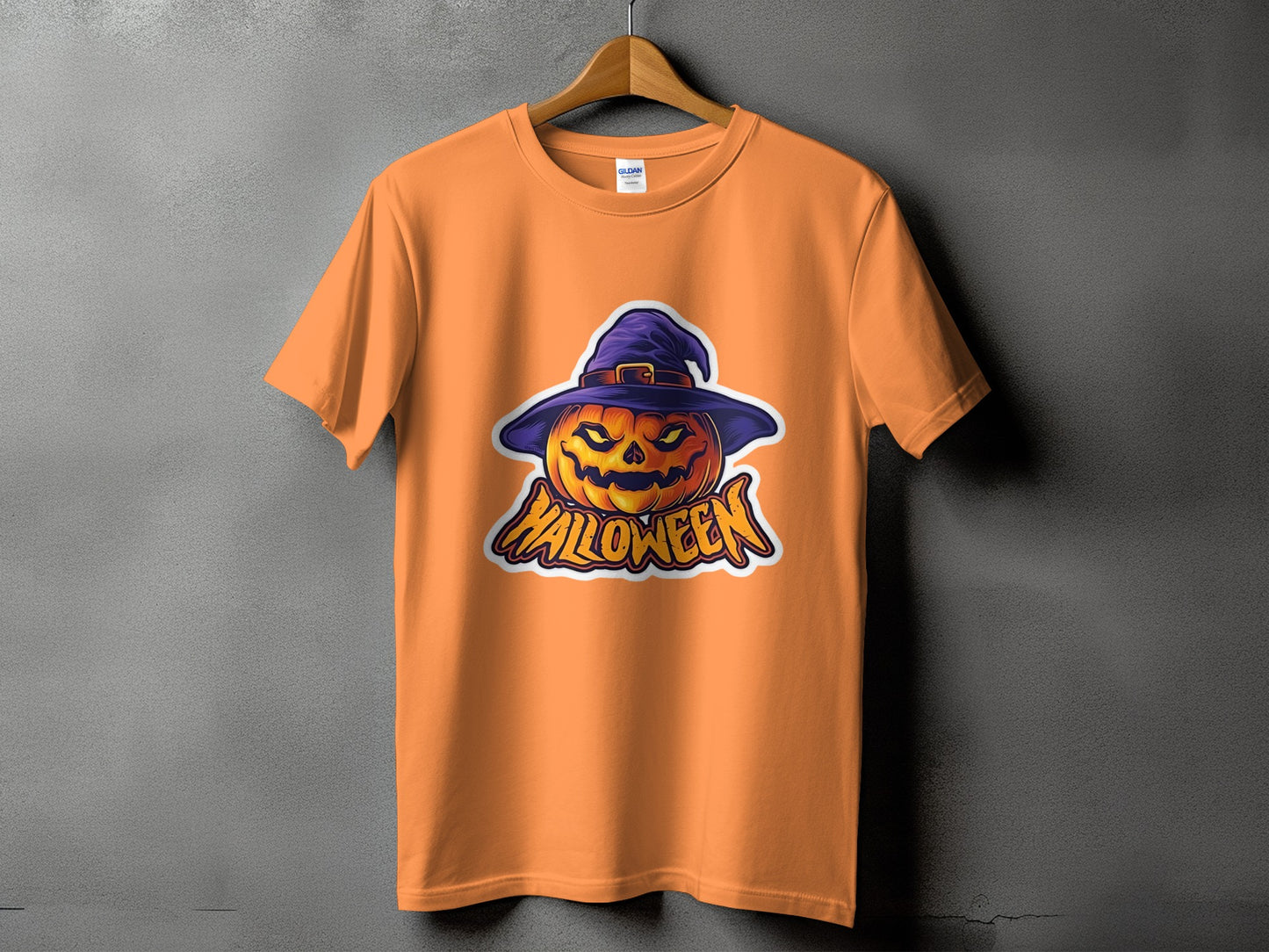 Orange t-shirt with a Jack-o'-lantern wearing a witch hat and "Halloween" text.