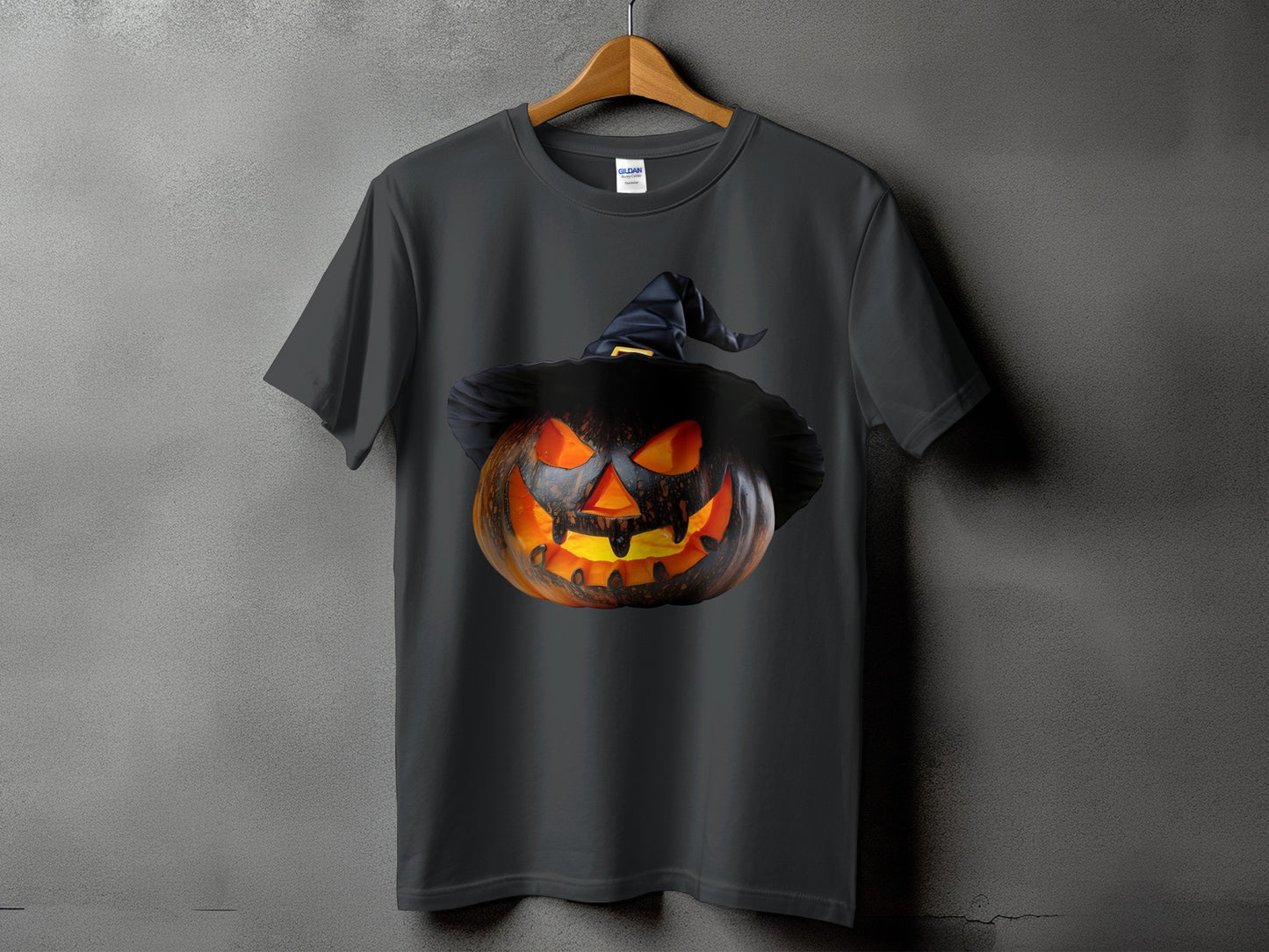 Dark gray t-shirt with a carved, glowing jack-o'-lantern wearing a witch hat.