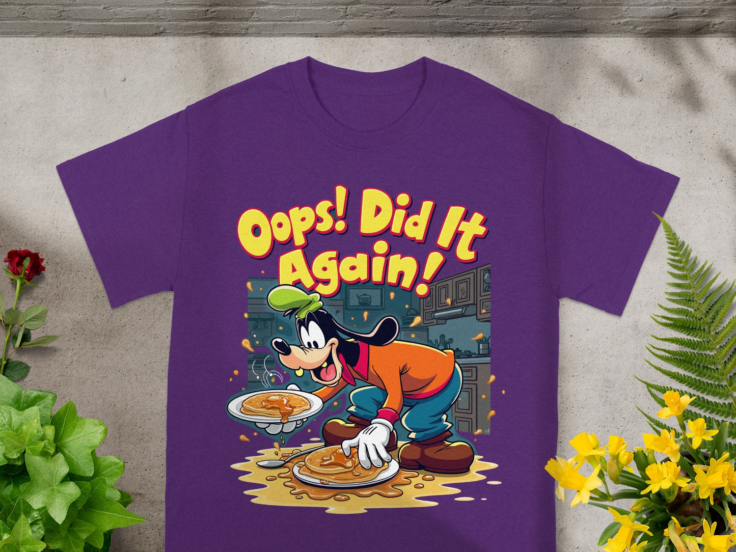 Goofy in kitchen with pancakes and text "Oops! Did it again!".