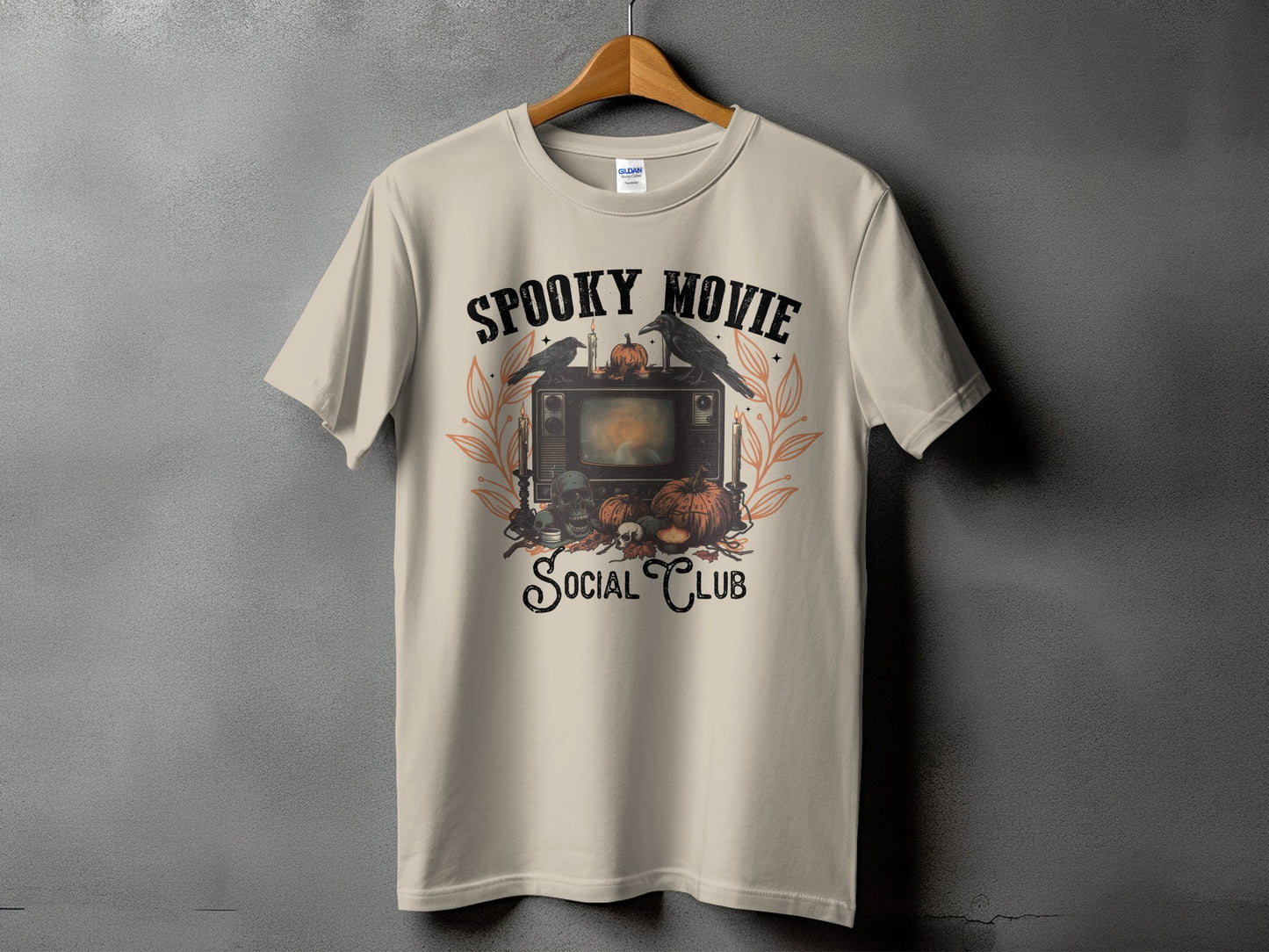 T-shirt with "Spooky Movie Social Club" text and Halloween graphic.