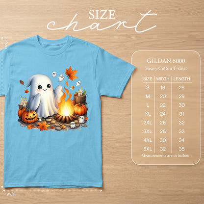 Light blue Gildan 5000 t-shirt with cartoon ghosts, pumpkins, campfire, and autumn leaves graphic.