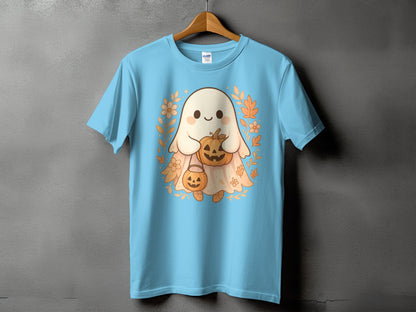 Light blue t-shirt with a cute ghost holding pumpkins and surrounded by fall leaves.