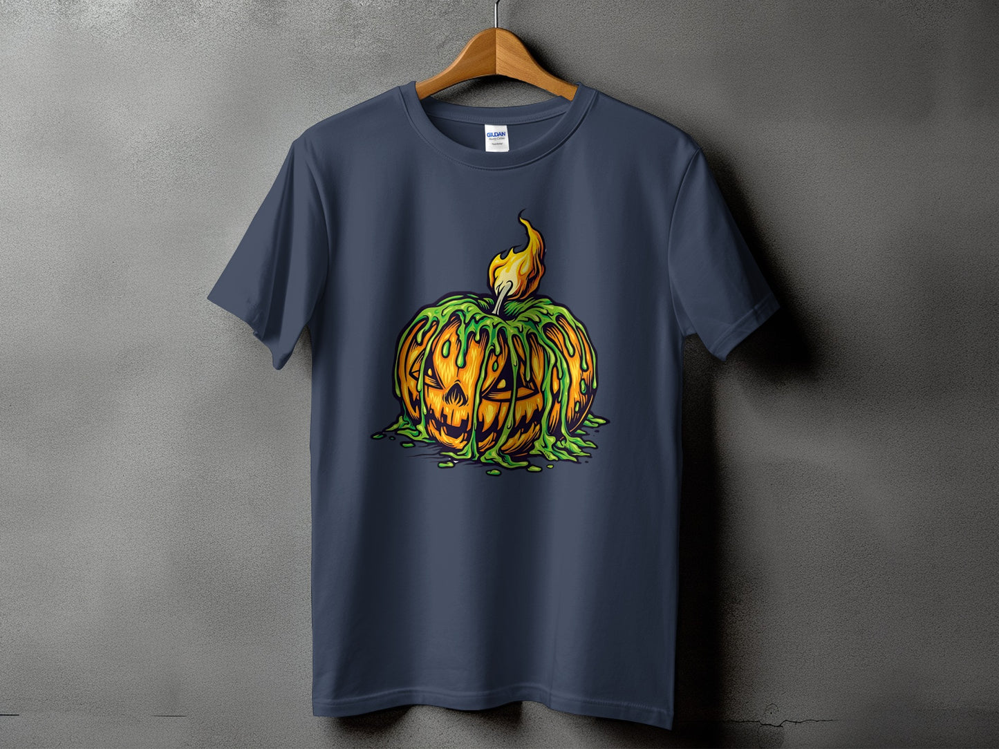 Dark blue t-shirt with a dripping jack-o'-lantern graphic and a flame on a hanger.