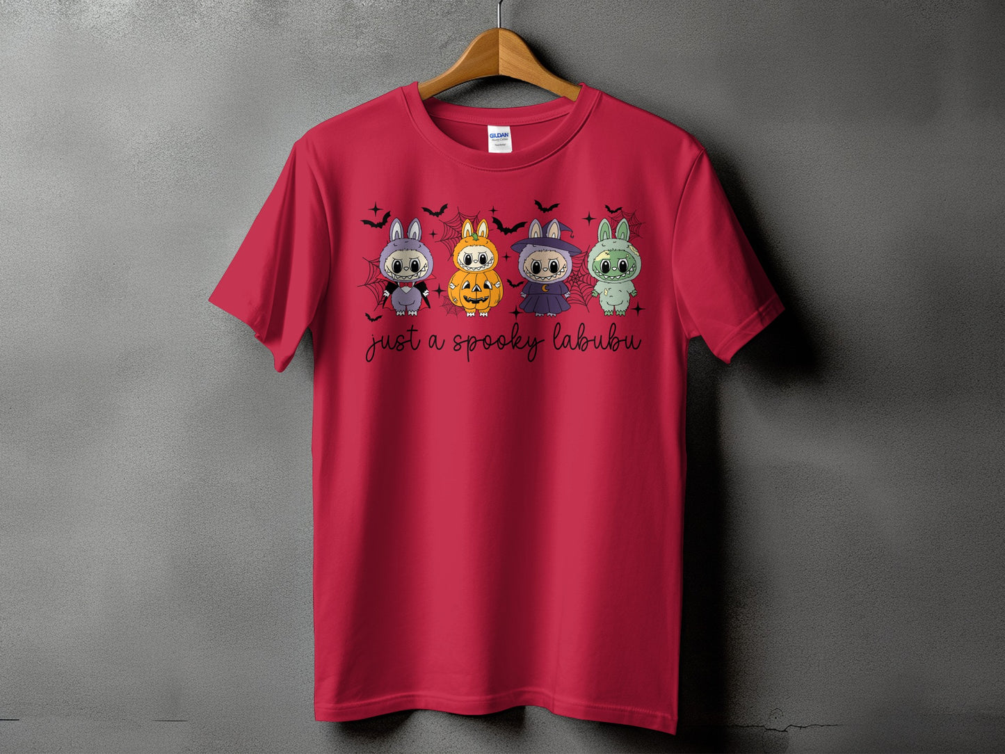 Red t-shirt with four cartoon characters and text "just a spooky labubu".