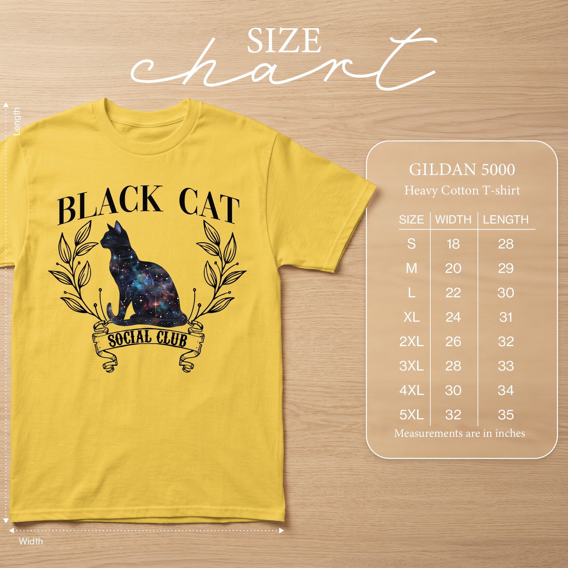 Yellow Gildan 5000 t-shirt with black cat galaxy graphic and size chart.