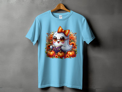 Light blue t-shirt with a cute ghost reading a book, wearing glasses and a bow.