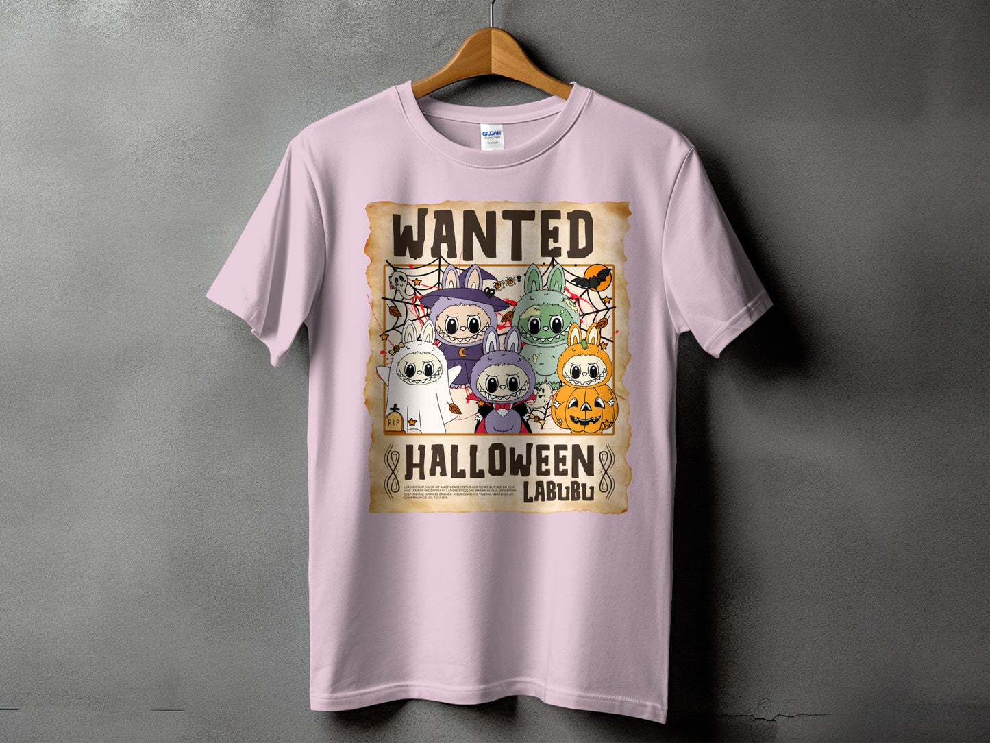 Pink t-shirt with Wanted Halloween Labubu cartoon characters and text.