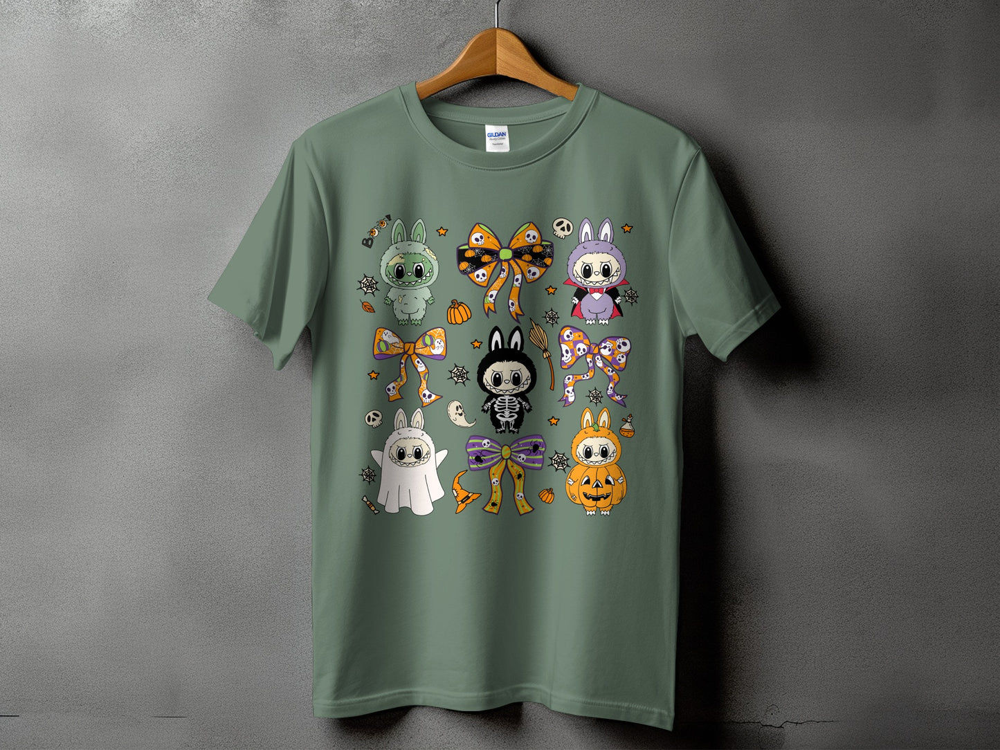 T-shirt with a collage of cute Halloween-themed bunnies and bows.