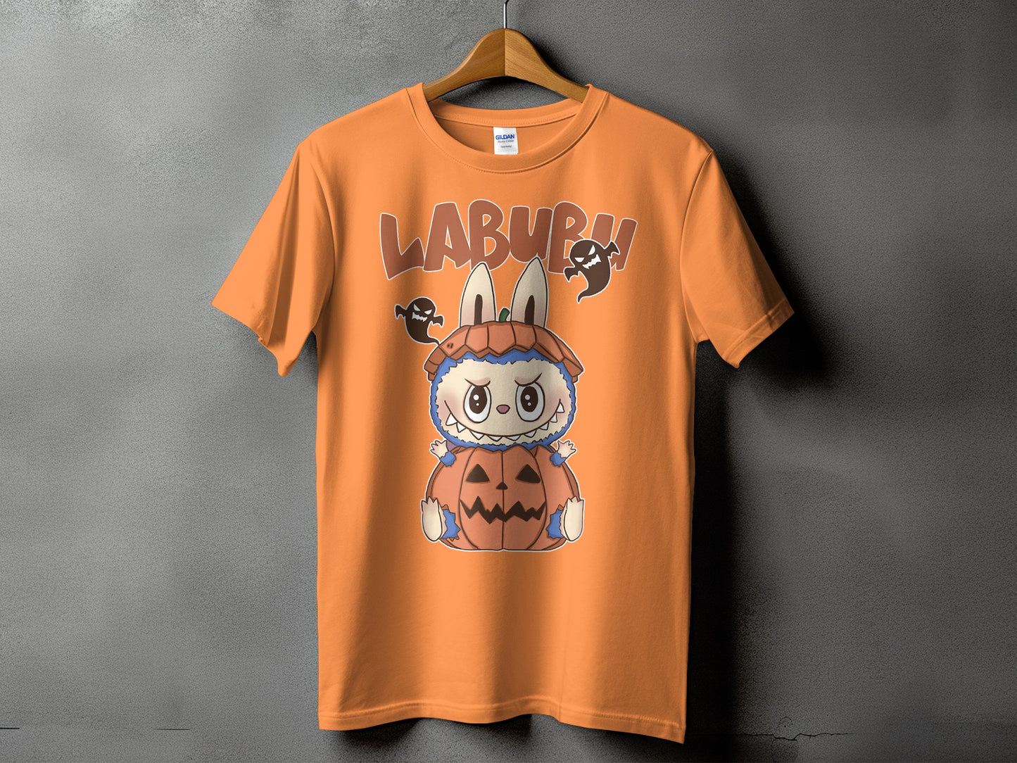 Orange t-shirt with "LABURR!" text and cartoon character in a pumpkin costume.