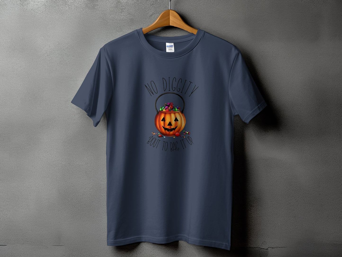 Dark blue t-shirt with pumpkin candy bucket graphic and text "No Diggity Bout To Bag It Up".