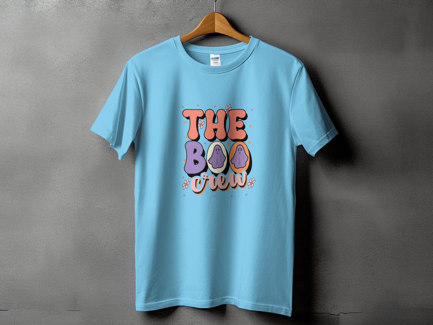 Light blue t-shirt with "The Boo Crew" text and ghost graphics.